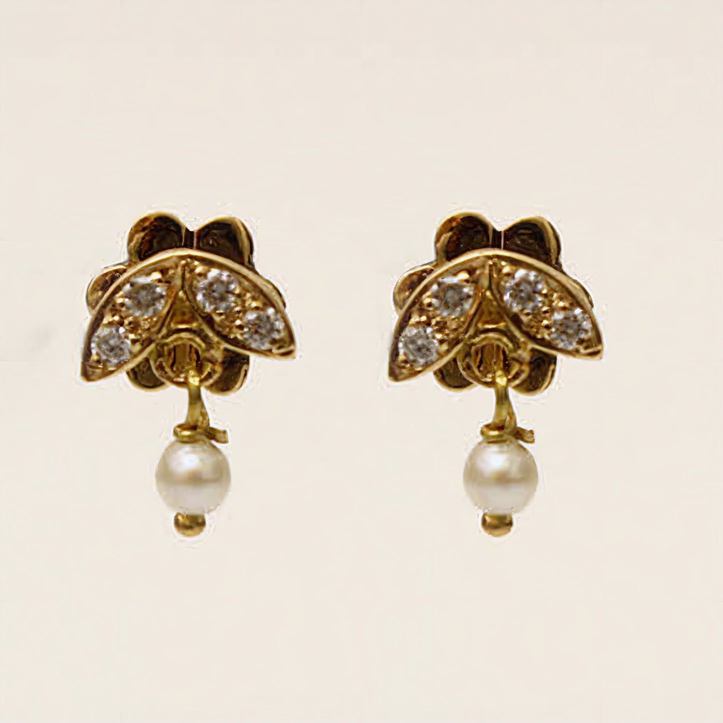 The Babyrasa Ashmita Leaf Gold, Pearl and Diamond Ear Studs by Rasvihar