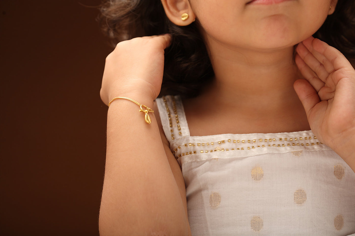 The Babyrasa Komal Cowrie Series Gold Ear Studs by Rasvihar