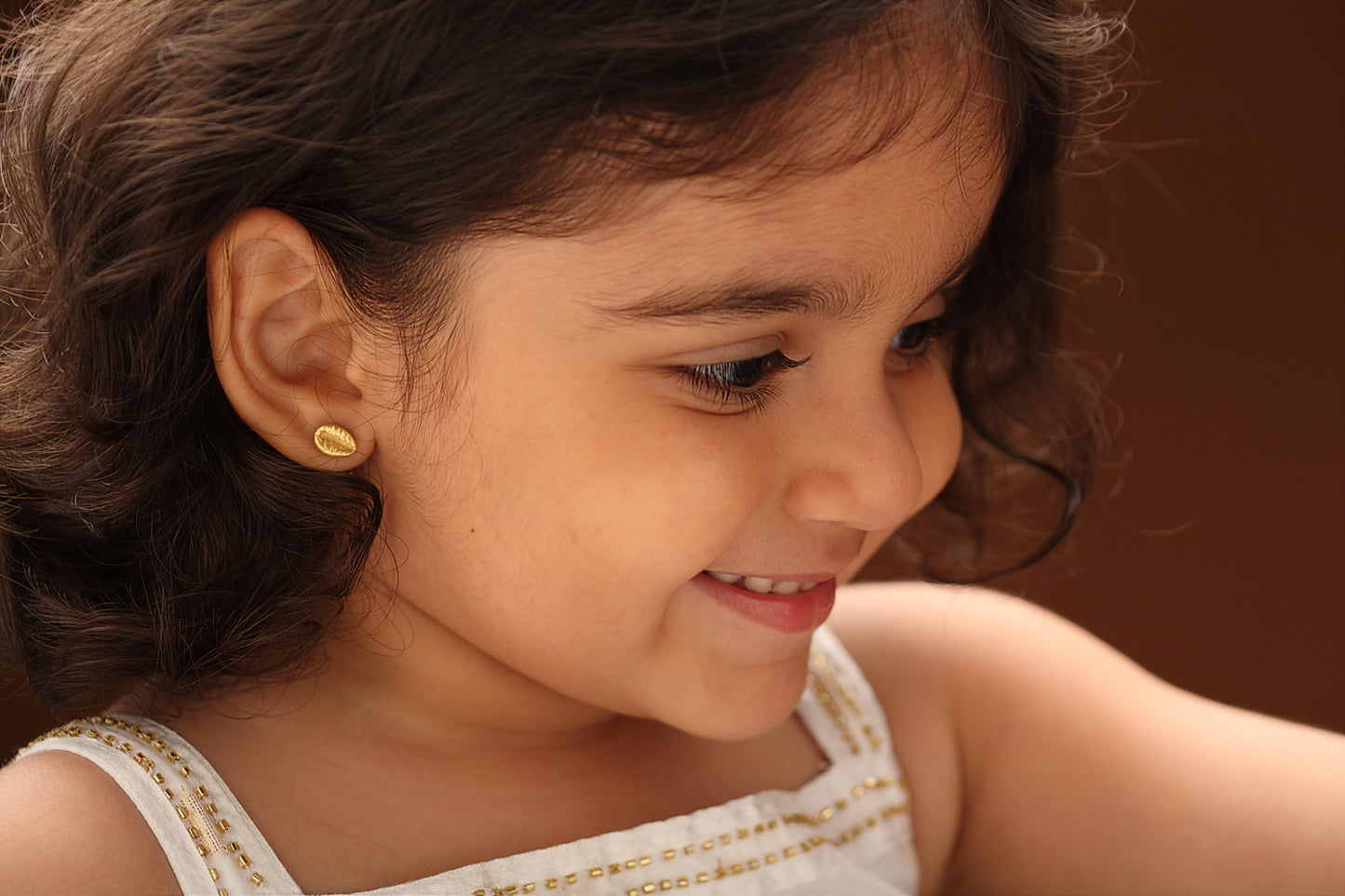 The Babyrasa Komal Cowrie Series Gold Ear Studs by Rasvihar