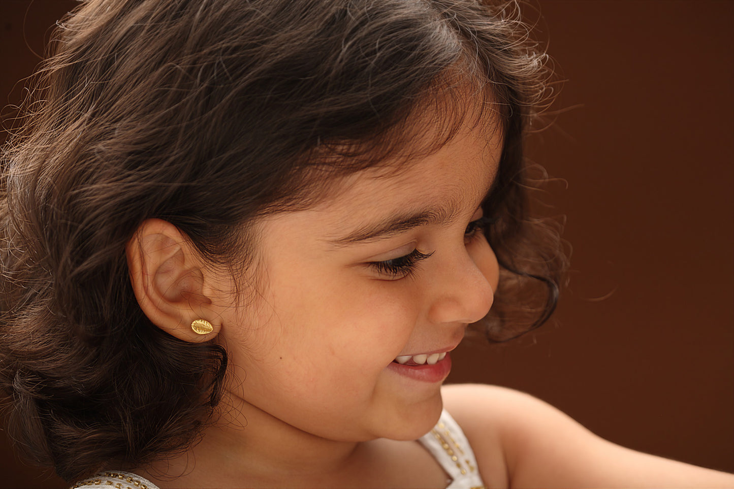 The Babyrasa Komal Cowrie Series Gold Ear Studs by Rasvihar