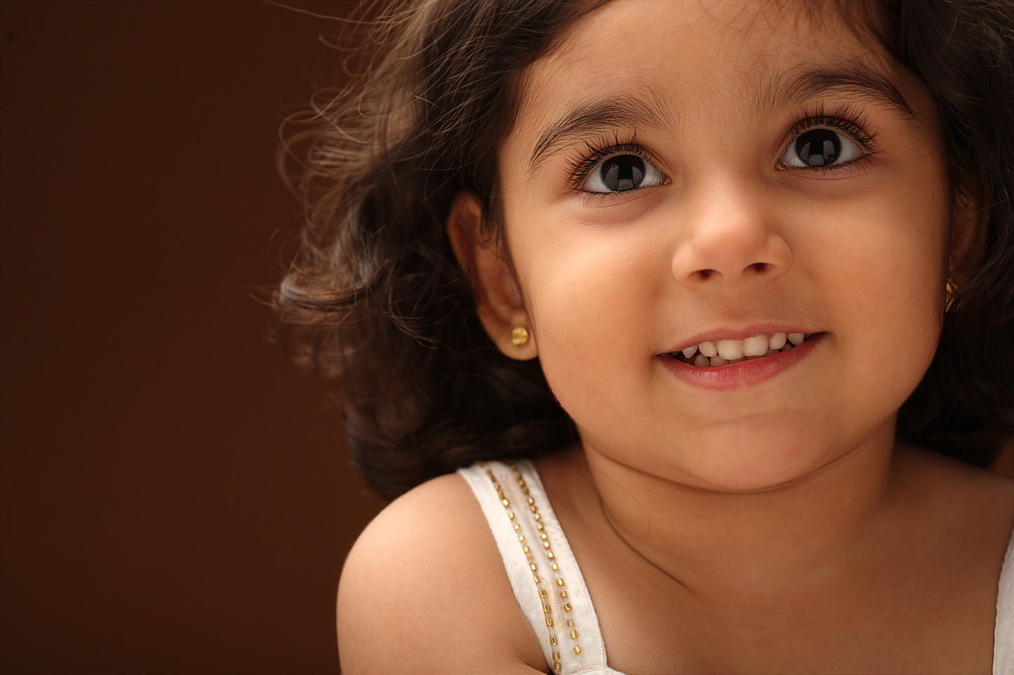 The Babyrasa Komal Cowrie Series Gold Ear Studs by Rasvihar
