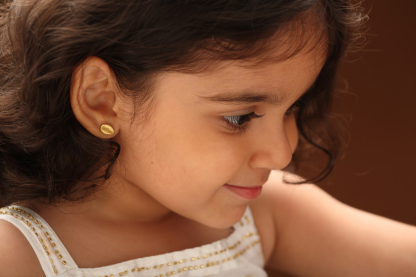 The Babyrasa Komal Cowrie Series Gold Ear Studs by Rasvihar