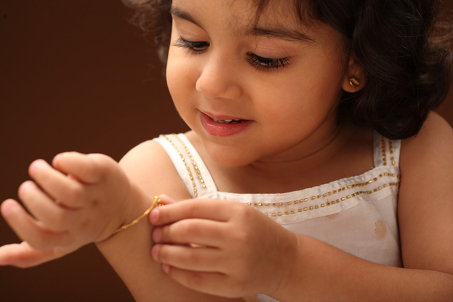 The Babyrasa Komal Cowrie Series Gold Ear Studs by Rasvihar