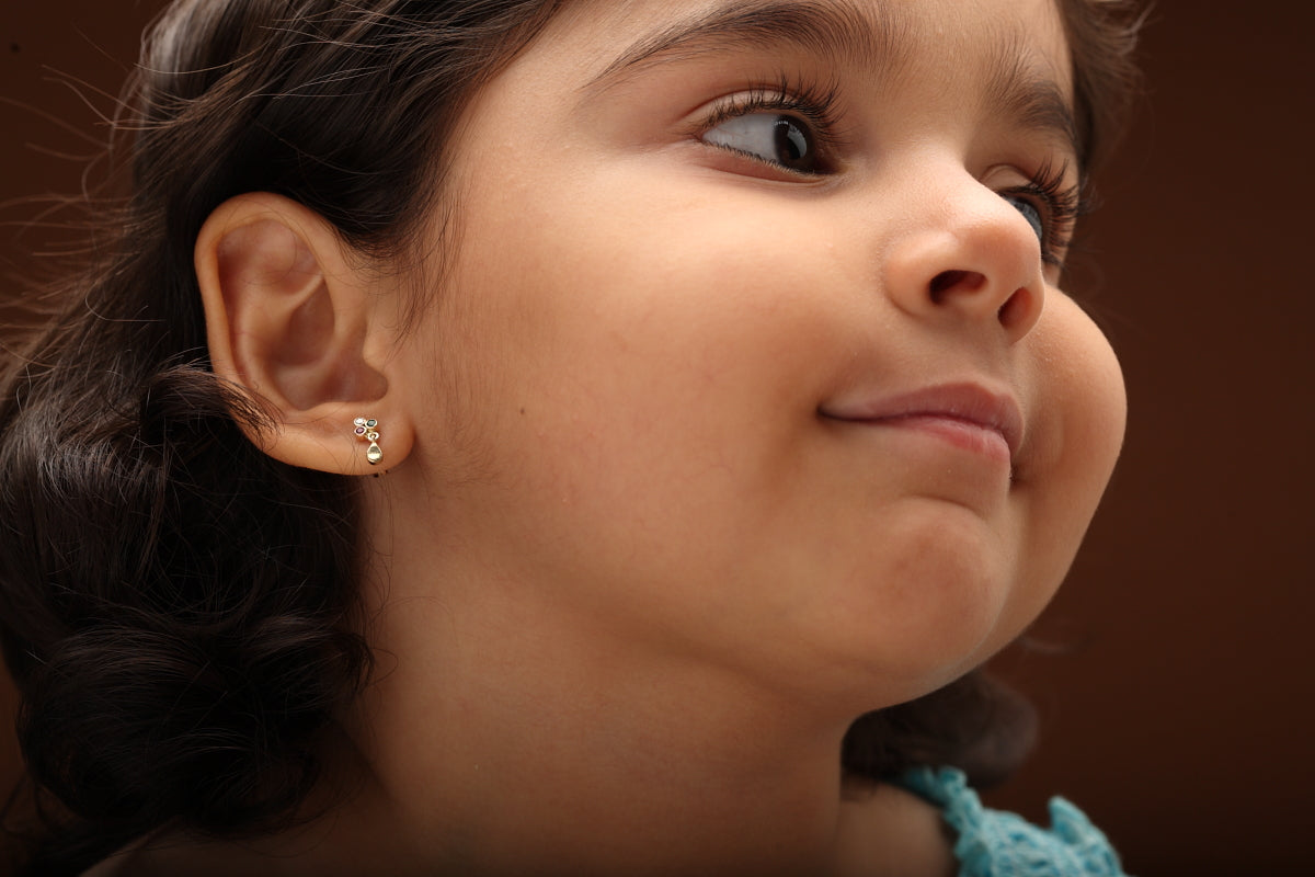 The Babyrasa Anjali Floral Gold, Diamond, Ruby and Emerald Ear Studs by Rasvihar