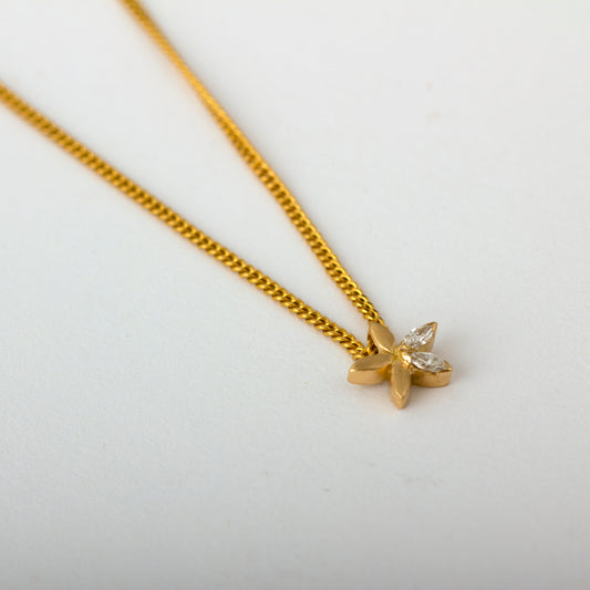 The Babyrasa Pavi Floral Gold and Diamond Pendant by Rasvihar