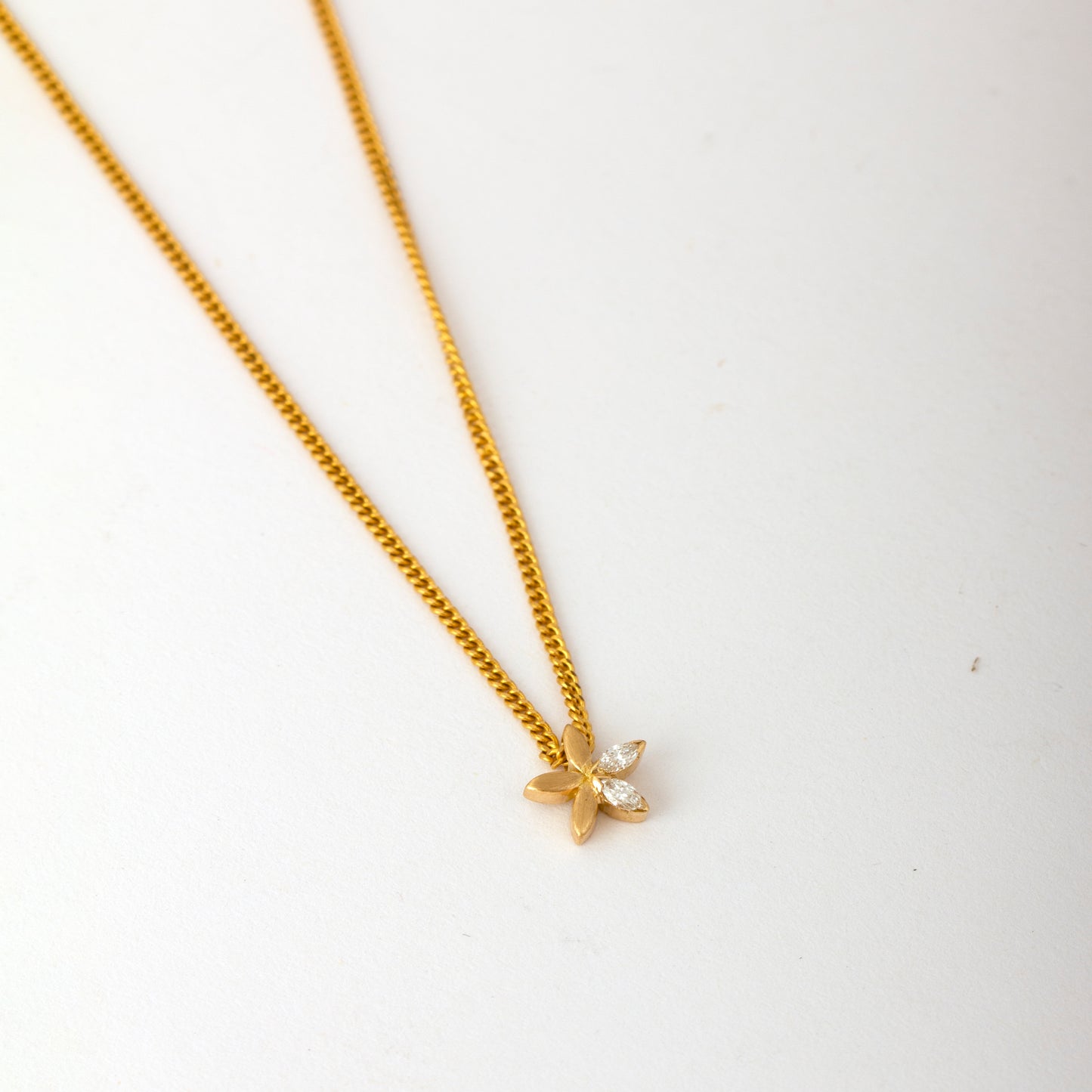 The Babyrasa Pavi Floral Gold and Diamond Pendant by Rasvihar