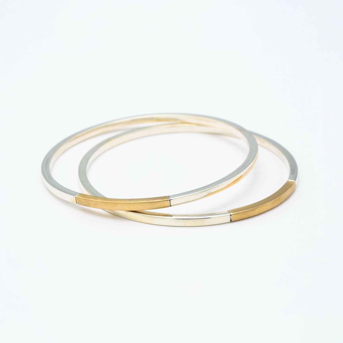 The Dholak SiGo Silver Gold Bangle by Rasvihar