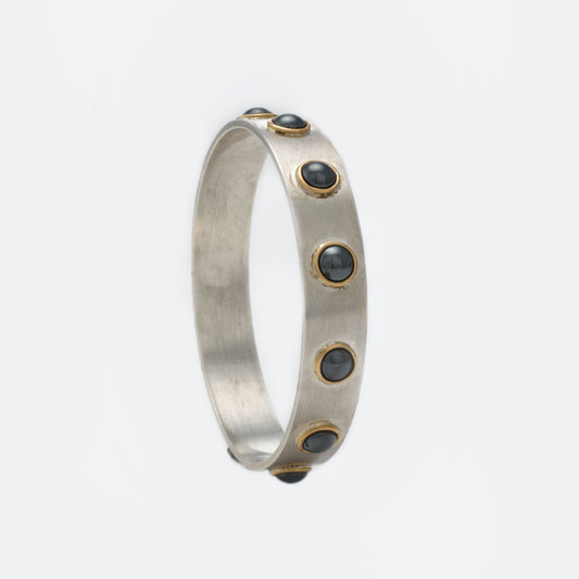 The Sandhya SiGo Silver Gold and Hematite Bangle by Rasvihar