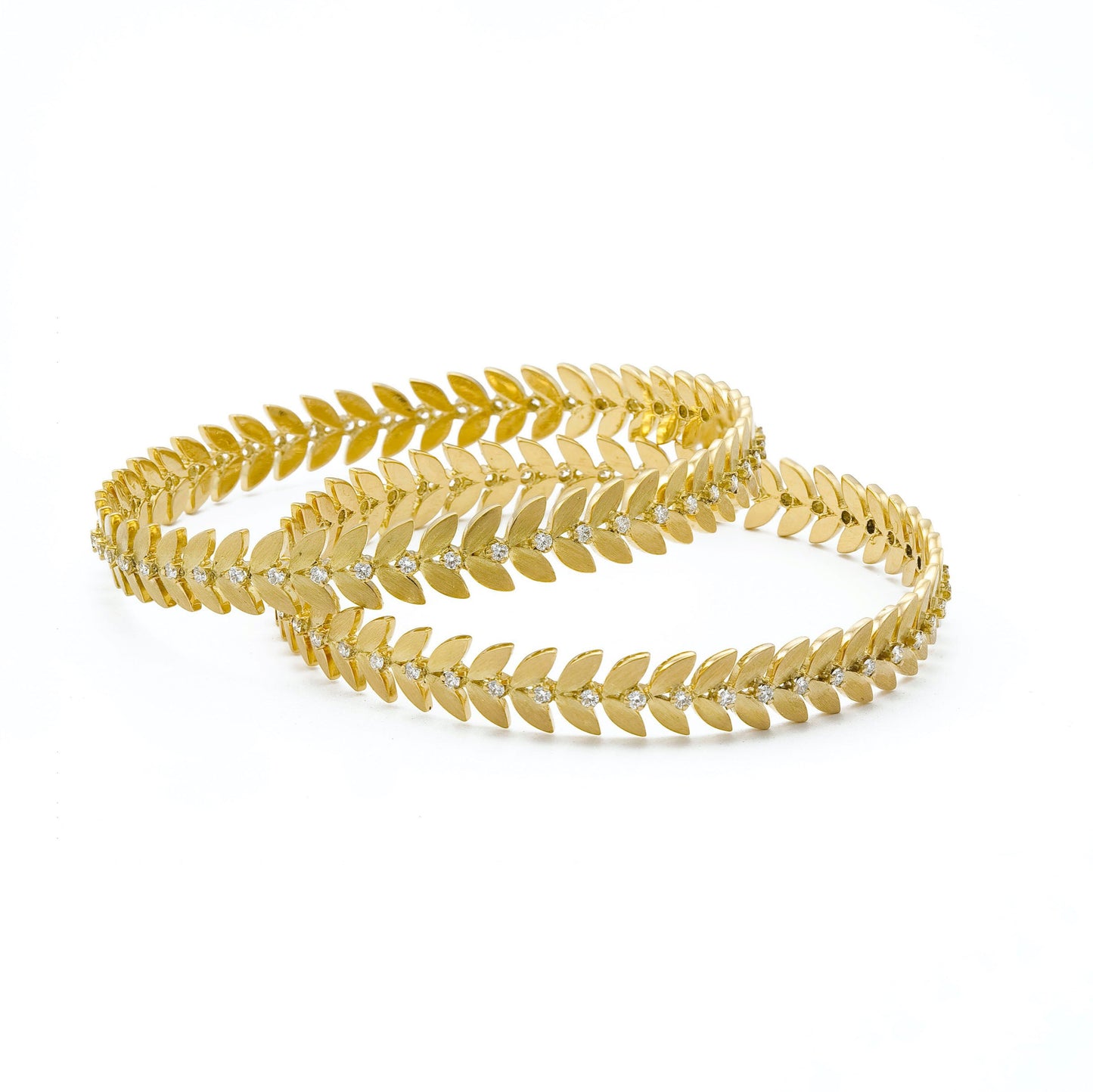 The Zenith Leaf Series Gold and Diamond Bangle by Rasvihar