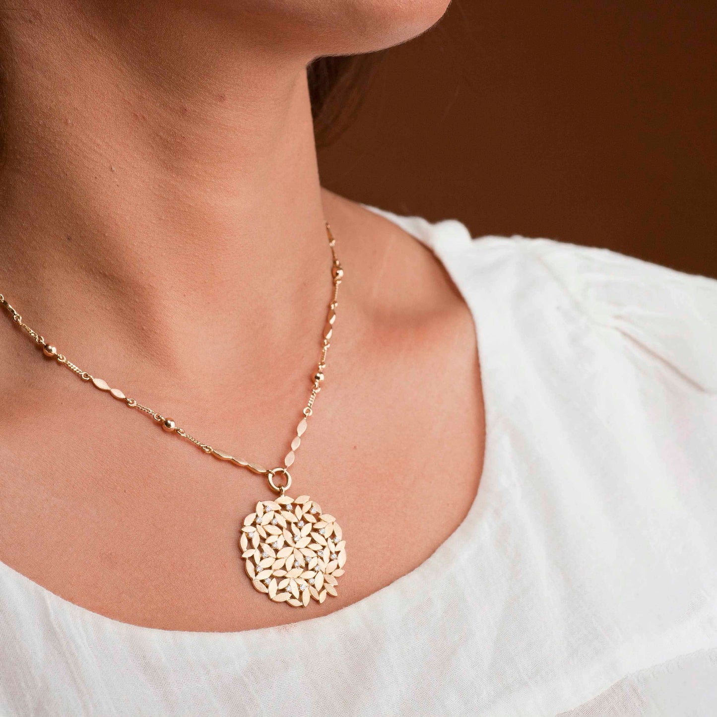 The Dhanashri Leaf Series Gold and Diamond Pendant by Rasvihar