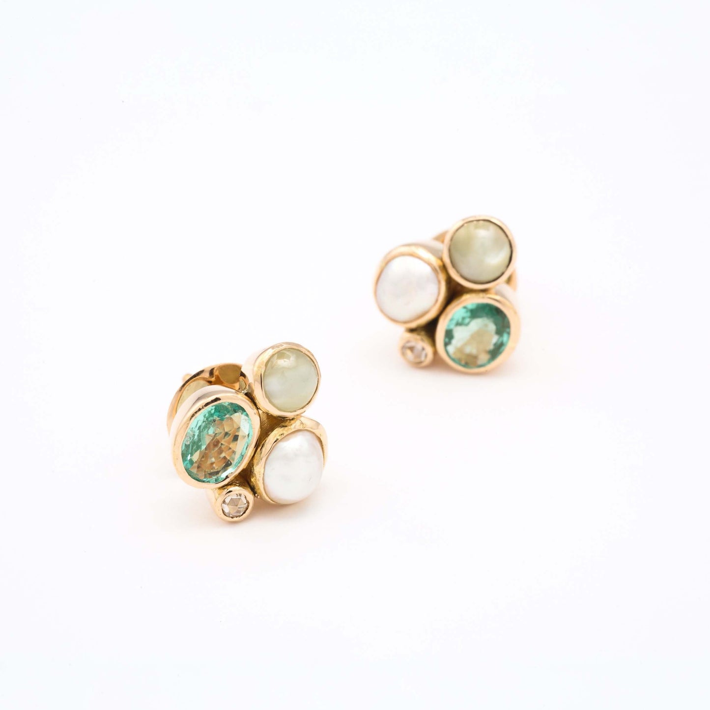 The Mansi Gold, Cat's Eye, Emerald, Diamond and Pearl Ear Studs by Rasvihar