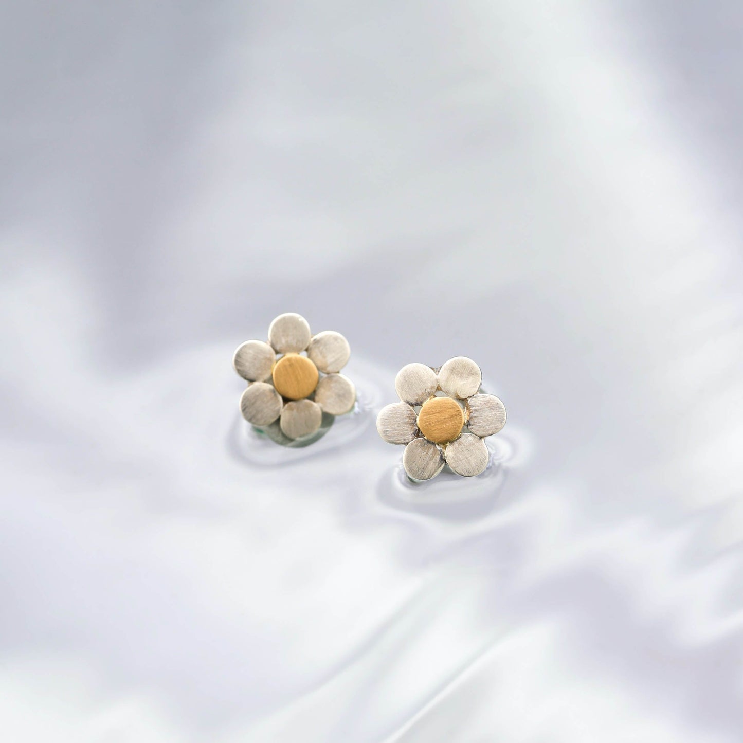 The Varshini SiGo Silver Gold Ear Studs by Rasvihar