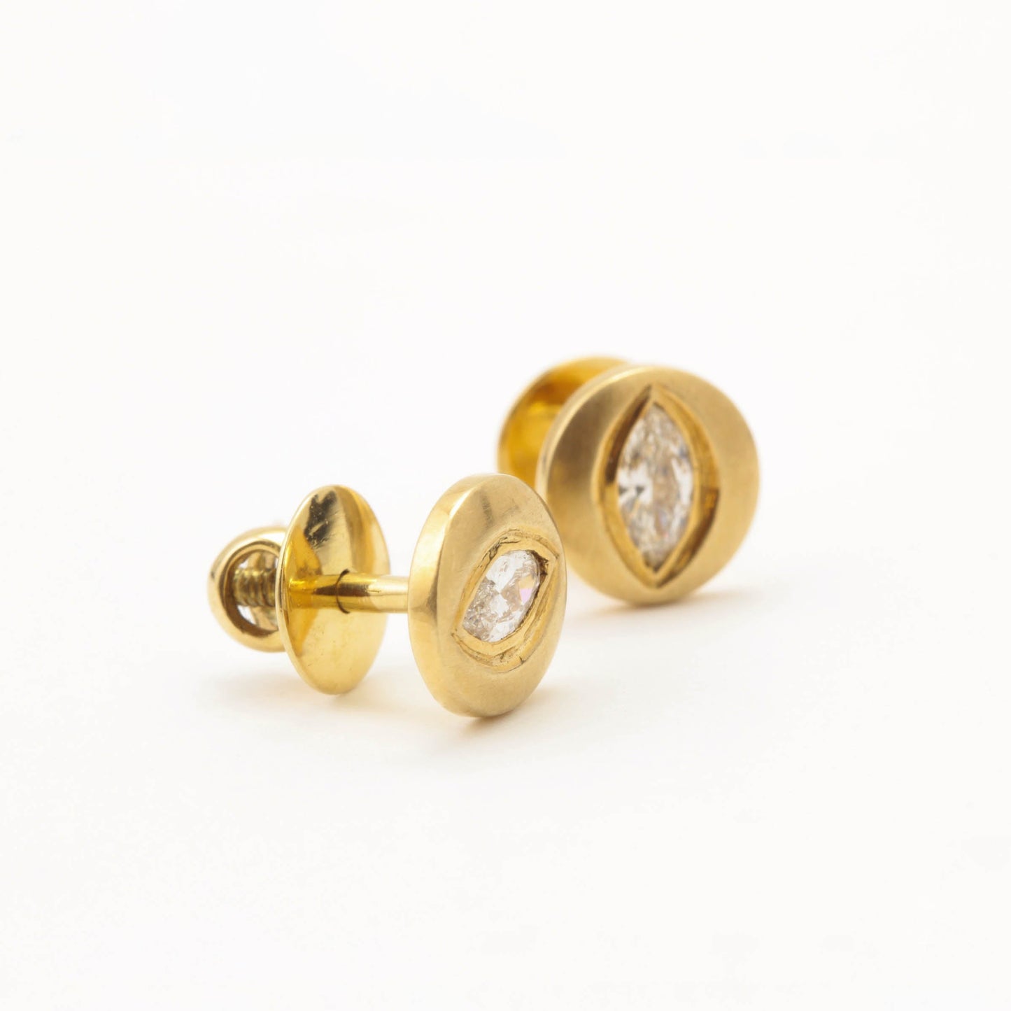 The Trinetra Gold and Diamond Ear Studs by Rasvihar