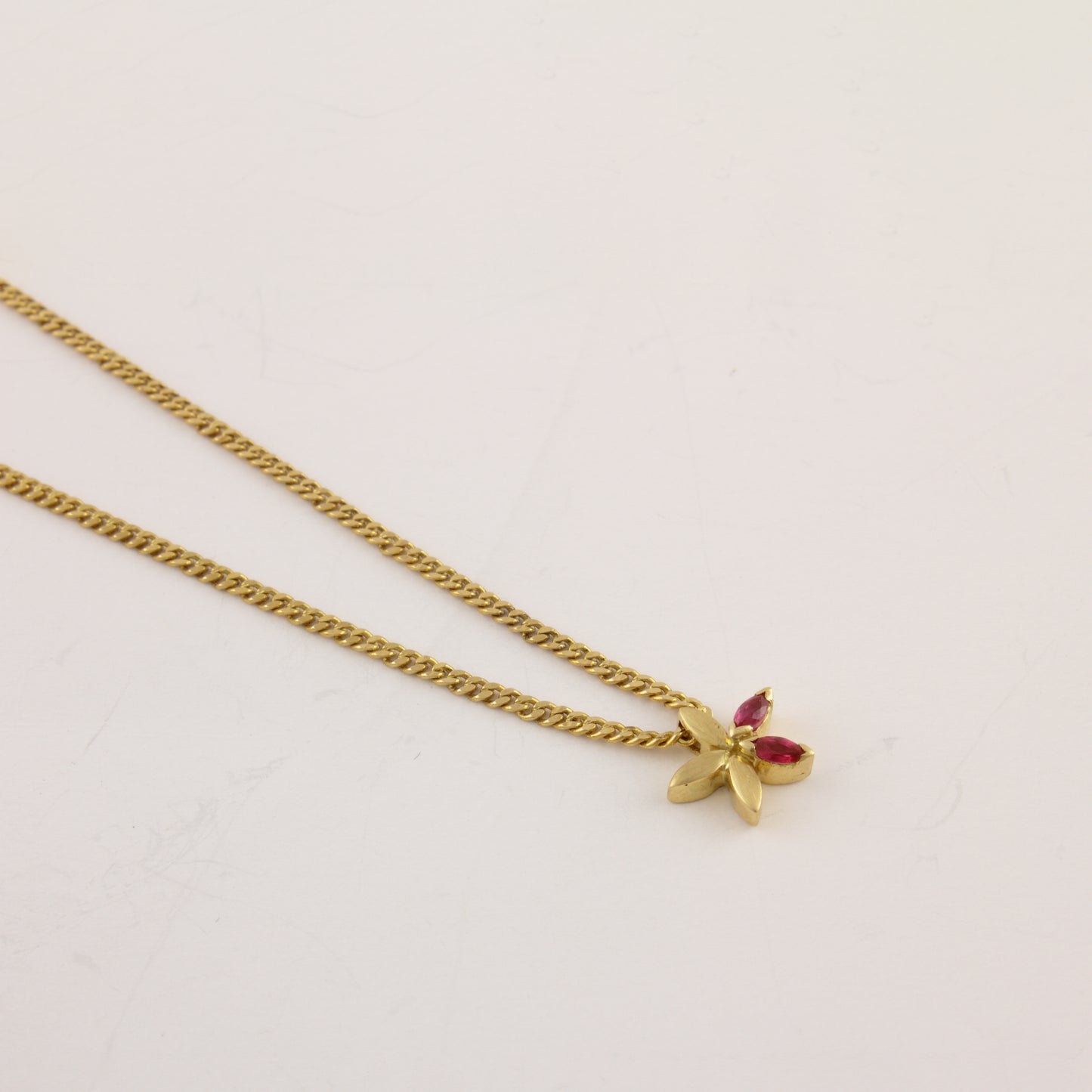 The Babyrasa Uttara Floral Gold and Ruby Pendant by Rasvihar