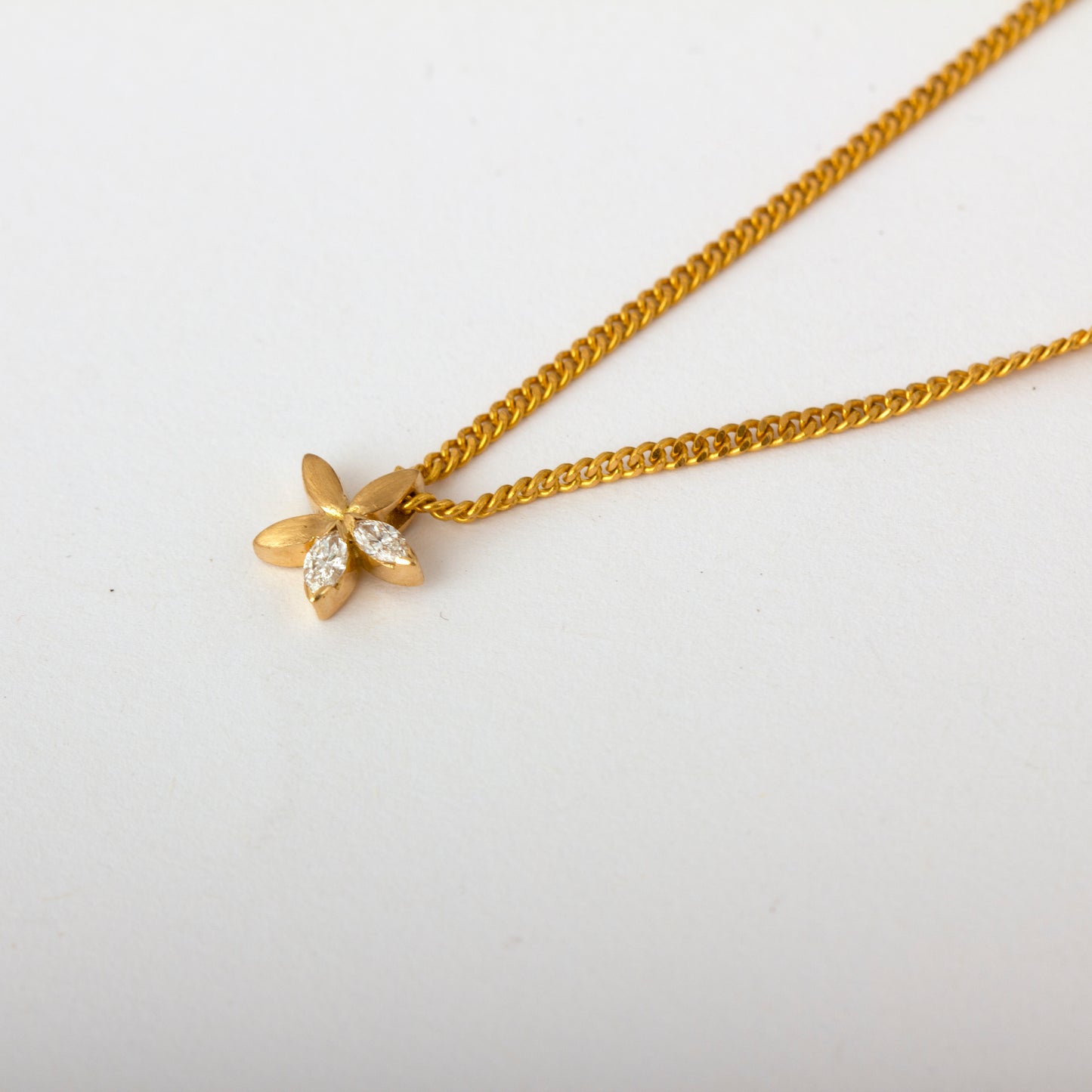 The Babyrasa Pavi Floral Gold and Diamond Pendant by Rasvihar