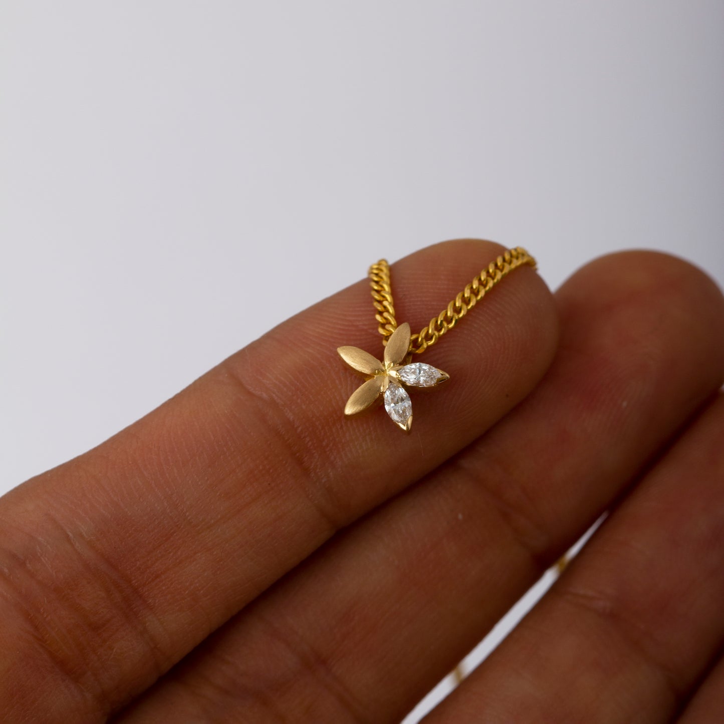 The Babyrasa Pavi Floral Gold and Diamond Pendant by Rasvihar