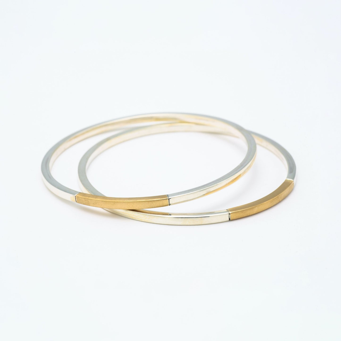 The Dholak SiGo Silver Gold Bangle by Rasvihar