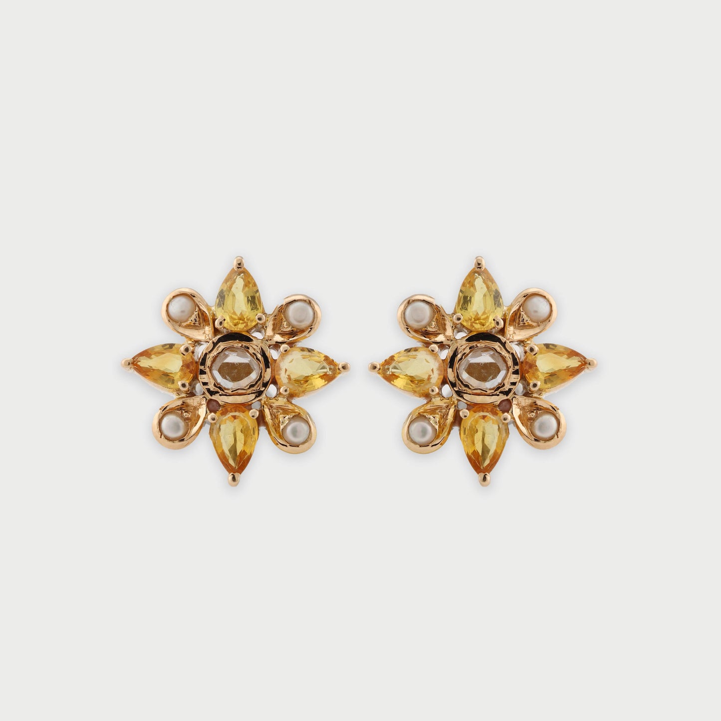 The Gunjan Gold, Diamond, Yellow Sapphire and Pearl Ear Studs by Rasvihar