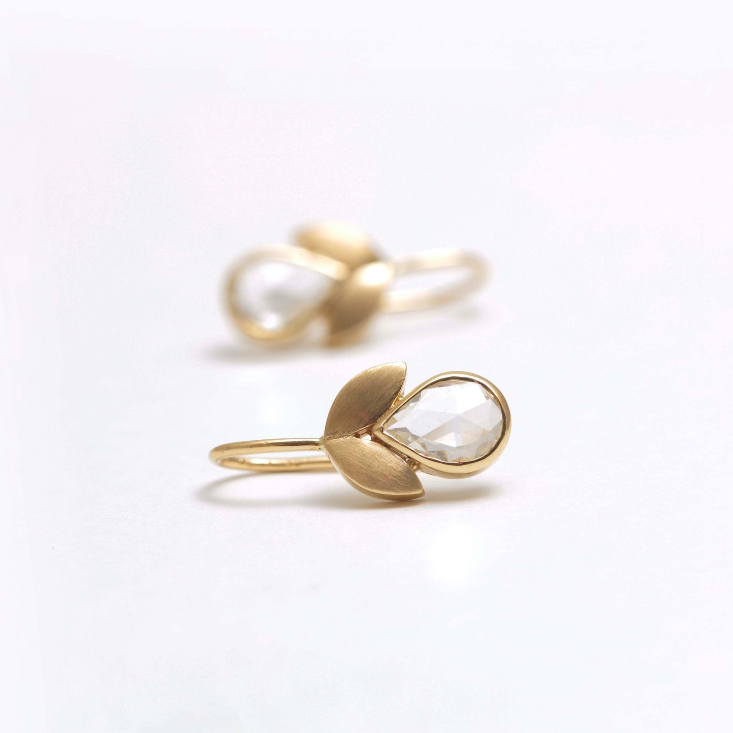 The Vani Gold and White Sapphire Hook Earrings by Rasvihar